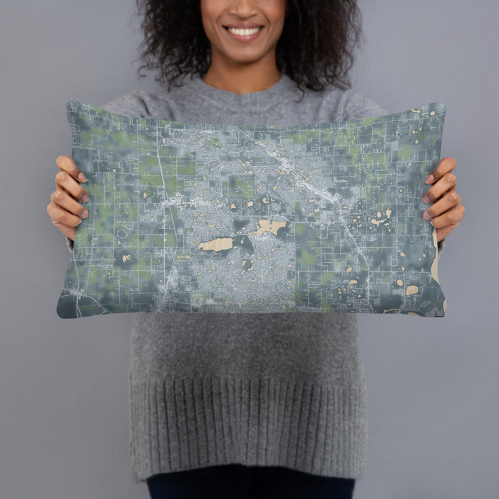 Person holding 20x12 Custom The Villages Florida Map Throw Pillow in Afternoon