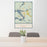 24x36 Tomahawk Wisconsin Map Print Portrait Orientation in Woodblock Style Behind 2 Chairs Table and Potted Plant