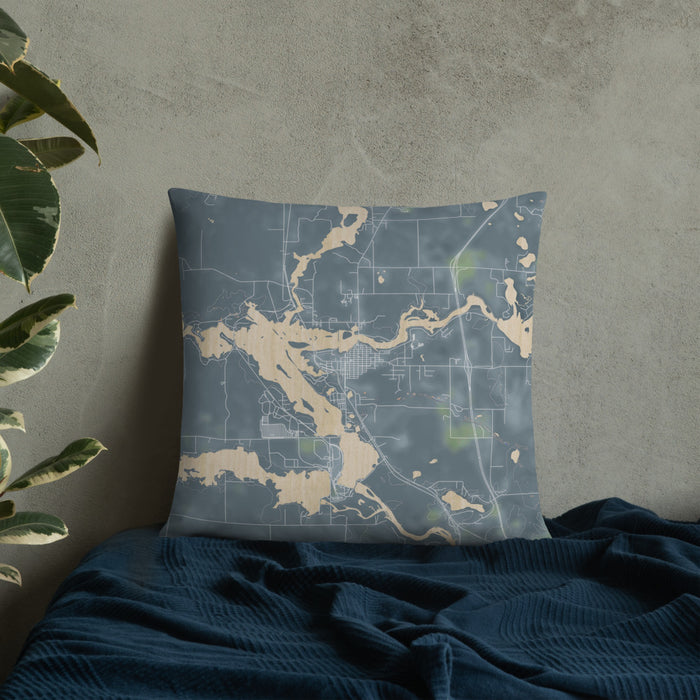 Custom Tomahawk Wisconsin Map Throw Pillow in Afternoon on Bedding Against Wall