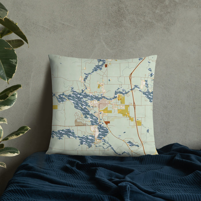 Custom Tomahawk Wisconsin Map Throw Pillow in Woodblock on Bedding Against Wall