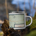 Right View Custom Tonopah Nevada Map Enamel Mug in Woodblock on Grass With Trees in Background