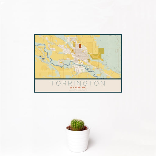 12x18 Torrington Wyoming Map Print Landscape Orientation in Woodblock Style With Small Cactus Plant in White Planter