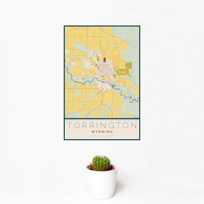 12x18 Torrington Wyoming Map Print Portrait Orientation in Woodblock Style With Small Cactus Plant in White Planter