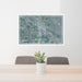 24x36 Torrington Wyoming Map Print Lanscape Orientation in Afternoon Style Behind 2 Chairs Table and Potted Plant