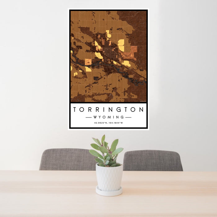24x36 Torrington Wyoming Map Print Portrait Orientation in Ember Style Behind 2 Chairs Table and Potted Plant