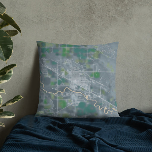 Custom Torrington Wyoming Map Throw Pillow in Afternoon on Bedding Against Wall