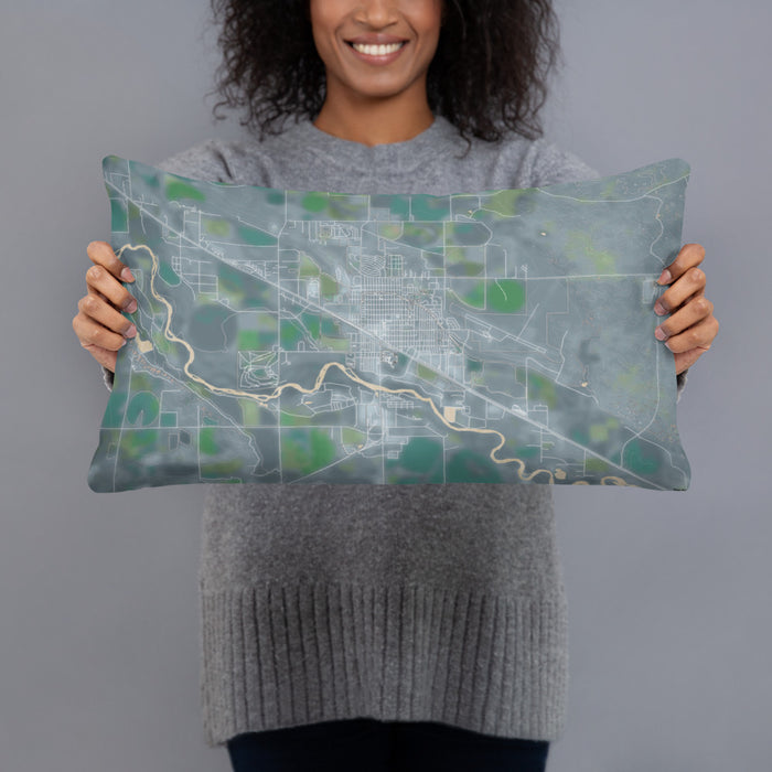 Person holding 20x12 Custom Torrington Wyoming Map Throw Pillow in Afternoon