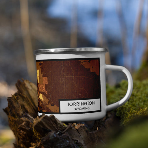 Right View Custom Torrington Wyoming Map Enamel Mug in Ember on Grass With Trees in Background