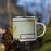 Right View Custom Torrington Wyoming Map Enamel Mug in Woodblock on Grass With Trees in Background