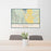 24x36 Townsend Montana Map Print Lanscape Orientation in Woodblock Style Behind 2 Chairs Table and Potted Plant