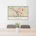 24x36 Trenton New Jersey Map Print Lanscape Orientation in Woodblock Style Behind 2 Chairs Table and Potted Plant