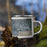 Right View Custom Trenton New Jersey Map Enamel Mug in Afternoon on Grass With Trees in Background