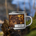 Right View Custom Trenton New Jersey Map Enamel Mug in Ember on Grass With Trees in Background