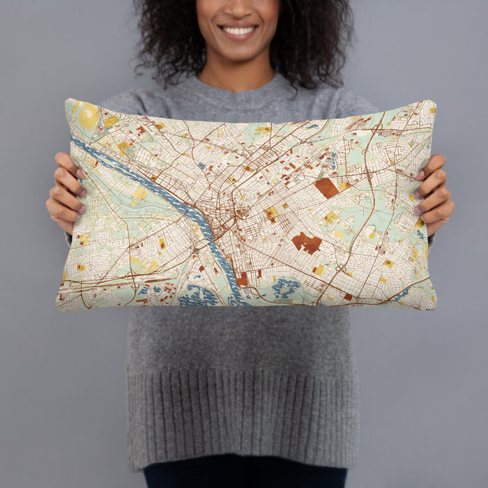Person holding 20x12 Custom Trenton New Jersey Map Throw Pillow in Woodblock