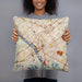 Person holding 18x18 Custom Trenton New Jersey Map Throw Pillow in Woodblock