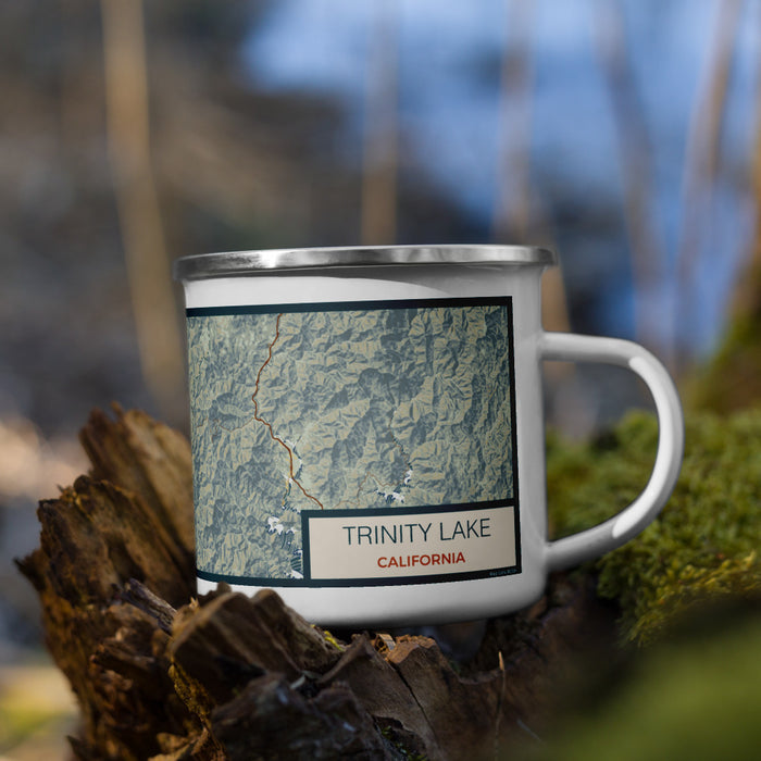 Right View Custom Trinity Lake California Map Enamel Mug in Woodblock on Grass With Trees in Background