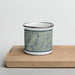 Front View Custom Trinity Lake California Map Enamel Mug in Woodblock on Cutting Board