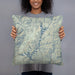 Person holding 18x18 Custom Trinity Lake California Map Throw Pillow in Woodblock