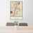 24x36 Troy New York Map Print Portrait Orientation in Woodblock Style Behind 2 Chairs Table and Potted Plant