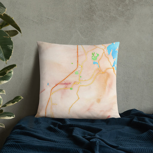 Custom Truth or Consequences New Mexico Map Throw Pillow in Watercolor on Bedding Against Wall