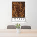 24x36 Tupelo Mississippi Map Print Portrait Orientation in Ember Style Behind 2 Chairs Table and Potted Plant
