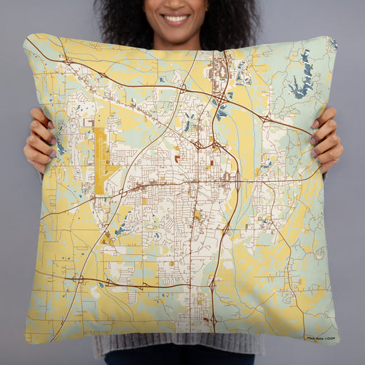 Person holding 22x22 Custom Tupelo Mississippi Map Throw Pillow in Woodblock