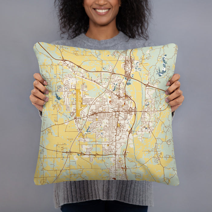 Person holding 18x18 Custom Tupelo Mississippi Map Throw Pillow in Woodblock