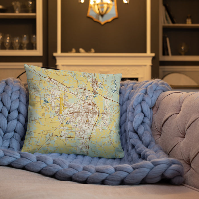 Custom Tupelo Mississippi Map Throw Pillow in Woodblock on Cream Colored Couch