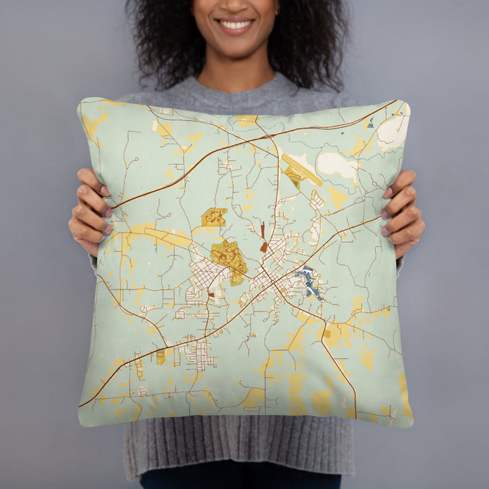 Person holding 18x18 Custom Tuskegee Alabama Map Throw Pillow in Woodblock