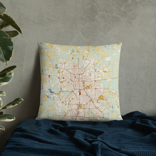 Custom Tyler Texas Map Throw Pillow in Woodblock on Bedding Against Wall