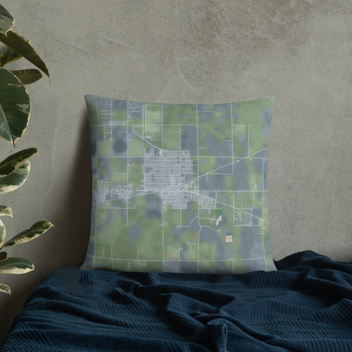 Custom Ulysses Kansas Map Throw Pillow in Afternoon on Bedding Against Wall