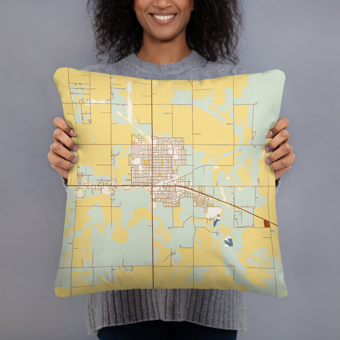 Person holding 18x18 Custom Ulysses Kansas Map Throw Pillow in Woodblock