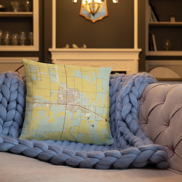 Custom Ulysses Kansas Map Throw Pillow in Woodblock on Cream Colored Couch