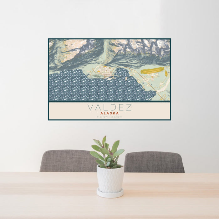 24x36 Valdez Alaska Map Print Lanscape Orientation in Woodblock Style Behind 2 Chairs Table and Potted Plant