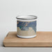 Front View Custom Valdez Alaska Map Enamel Mug in Afternoon on Cutting Board