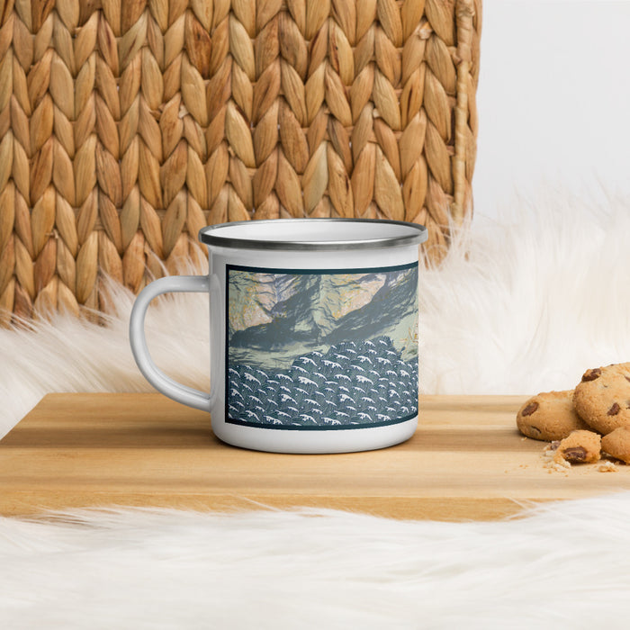 Left View Custom Valdez Alaska Map Enamel Mug in Woodblock on Table Top