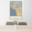 24x36 Ventura California Map Print Portrait Orientation in Woodblock Style Behind 2 Chairs Table and Potted Plant