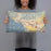 Person holding 20x12 Custom Ventura California Map Throw Pillow in Woodblock