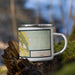 Right View Custom Vernal Utah Map Enamel Mug in Woodblock on Grass With Trees in Background