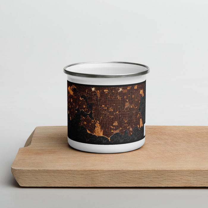 Front View Custom Victoria British Columbia Map Enamel Mug in Ember on Cutting Board