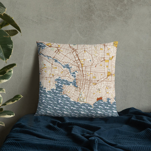 Custom Victoria British Columbia Map Throw Pillow in Woodblock on Bedding Against Wall