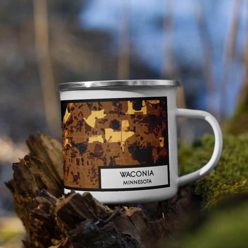 Right View Custom Waconia Minnesota Map Enamel Mug in Ember on Grass With Trees in Background