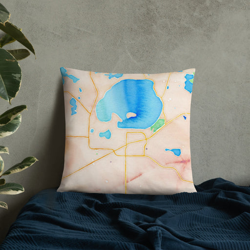Custom Waconia Minnesota Map Throw Pillow in Watercolor on Bedding Against Wall