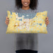 Person holding 20x12 Custom Waconia Minnesota Map Throw Pillow in Woodblock