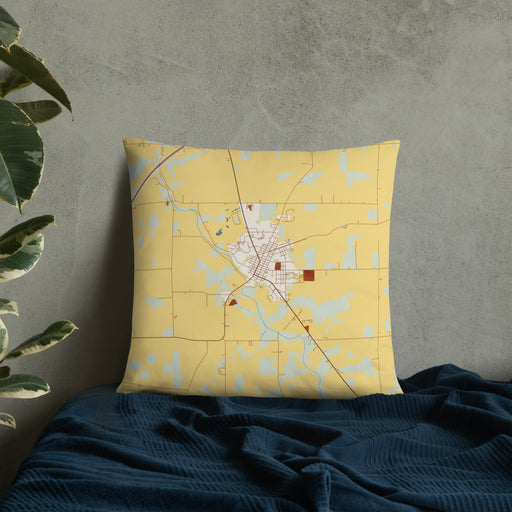 Custom Warren Indiana Map Throw Pillow in Woodblock on Bedding Against Wall