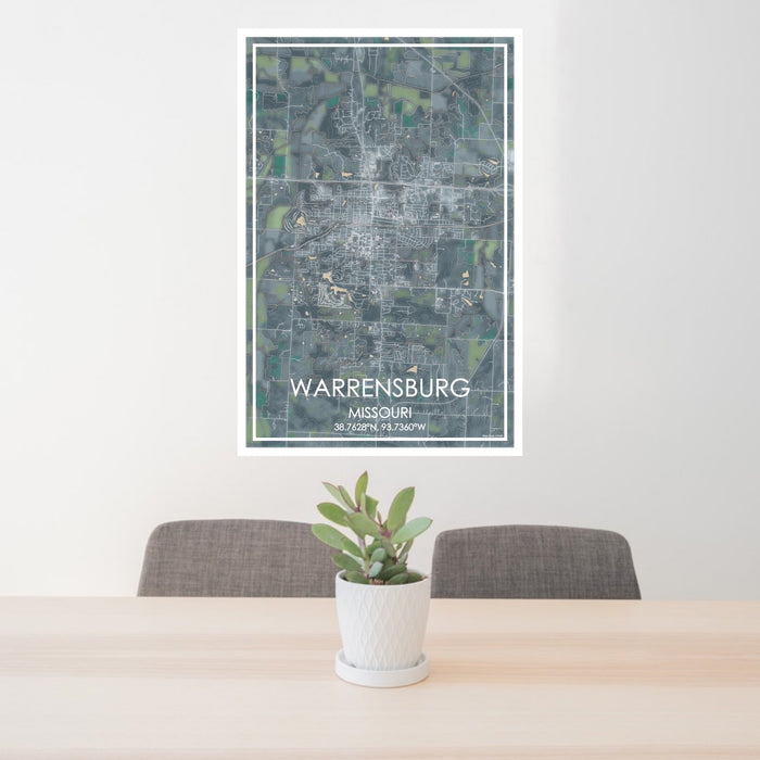 24x36 Warrensburg Missouri Map Print Portrait Orientation in Afternoon Style Behind 2 Chairs Table and Potted Plant