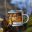 Right View Custom Warrensburg Missouri Map Enamel Mug in Ember on Grass With Trees in Background