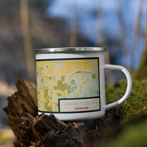 Right View Custom Warrensburg Missouri Map Enamel Mug in Woodblock on Grass With Trees in Background