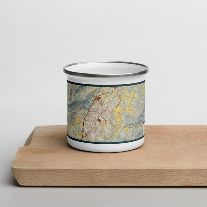 Front View Custom Waynesville North Carolina Map Enamel Mug in Woodblock on Cutting Board