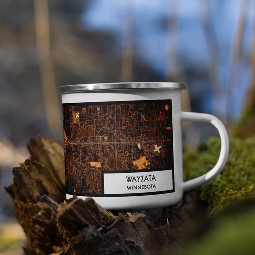 Right View Custom Wayzata Minnesota Map Enamel Mug in Ember on Grass With Trees in Background